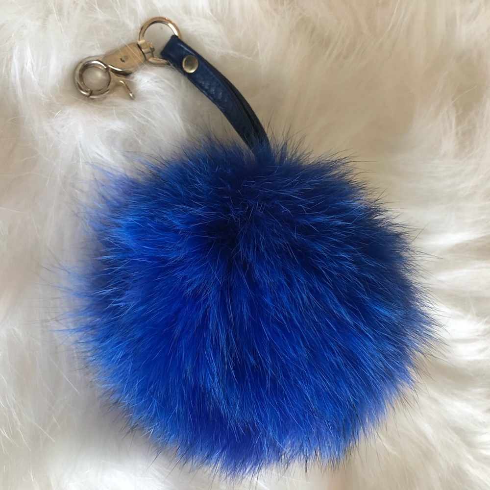 Fur pom pom keychain. Vibrant blue.